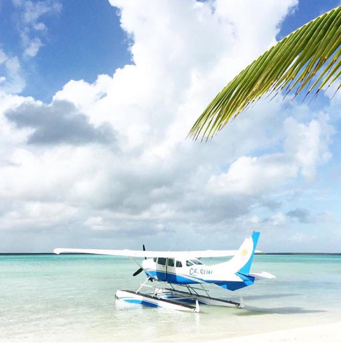 TIA seaplane on a Bahamian beach