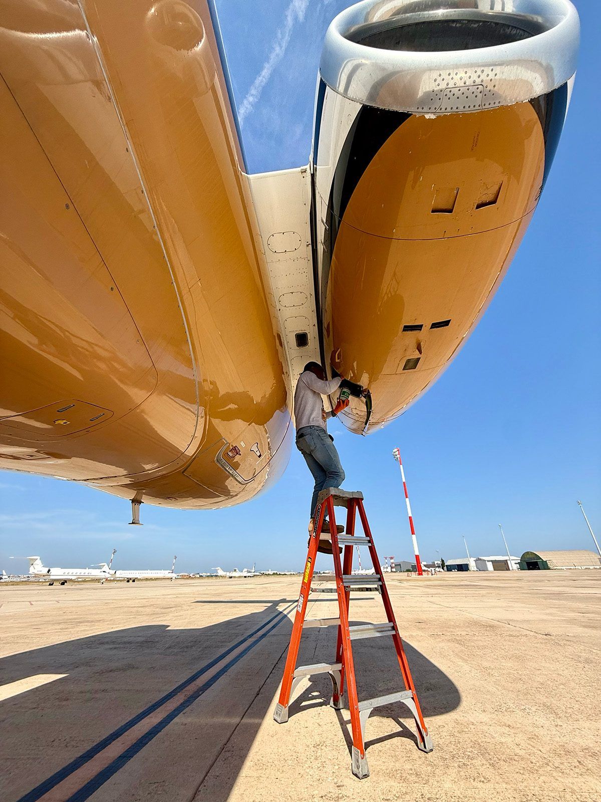 Aircraft maintenance technician responding to an AOG situation at Trans Island Airways' Nassau hangar