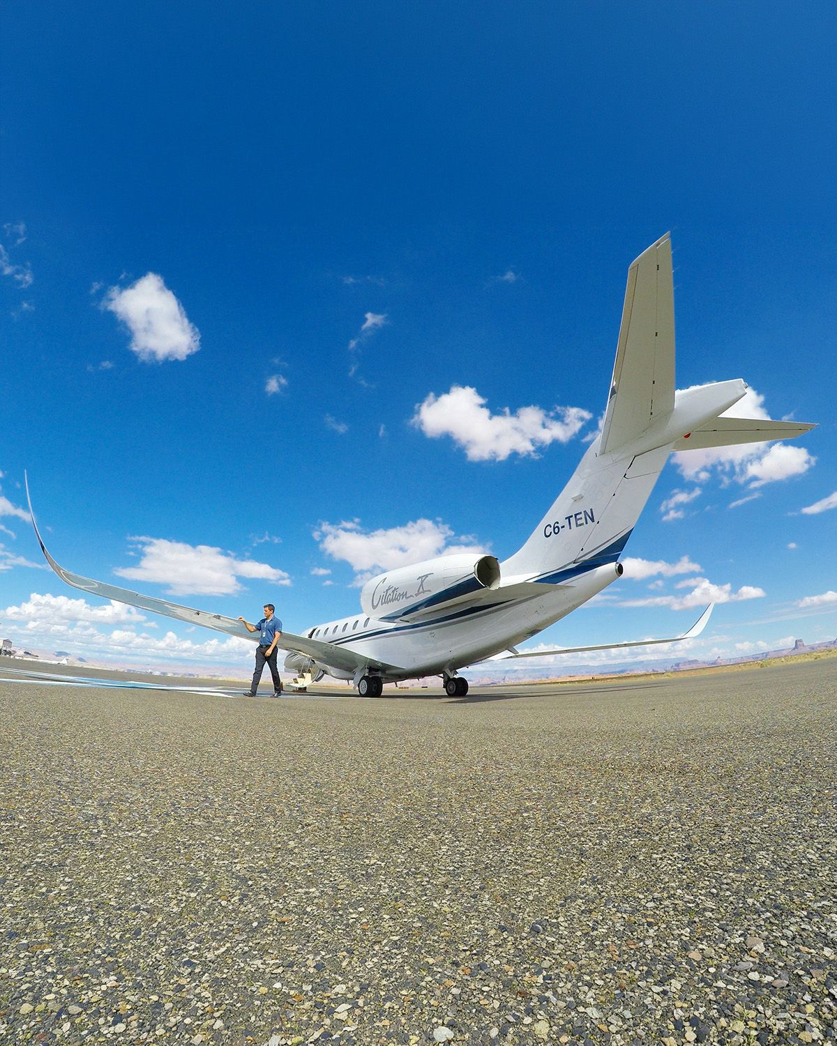 Trans Island Airways Citation X (C6-TEN) on a remote ramp, ready for departure
